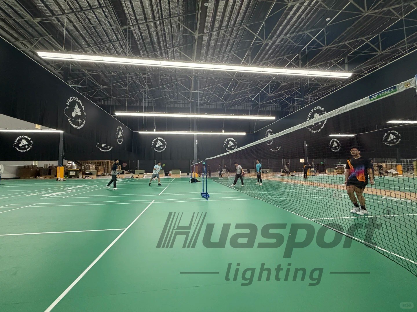 Australia badminton court lighting viewed from the player angle under long-bar anti-glare fixtures