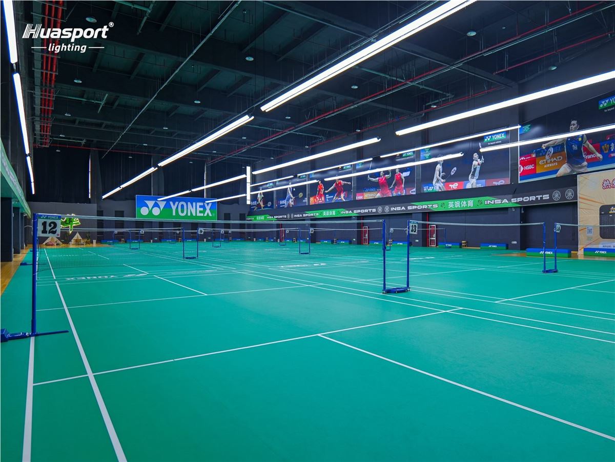 Badminton court lighting installation showing consistent rows of LED linear fixtures