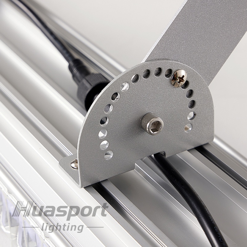 Huasport adjustable bracket detail for 30-degree inward badminton court lighting installation