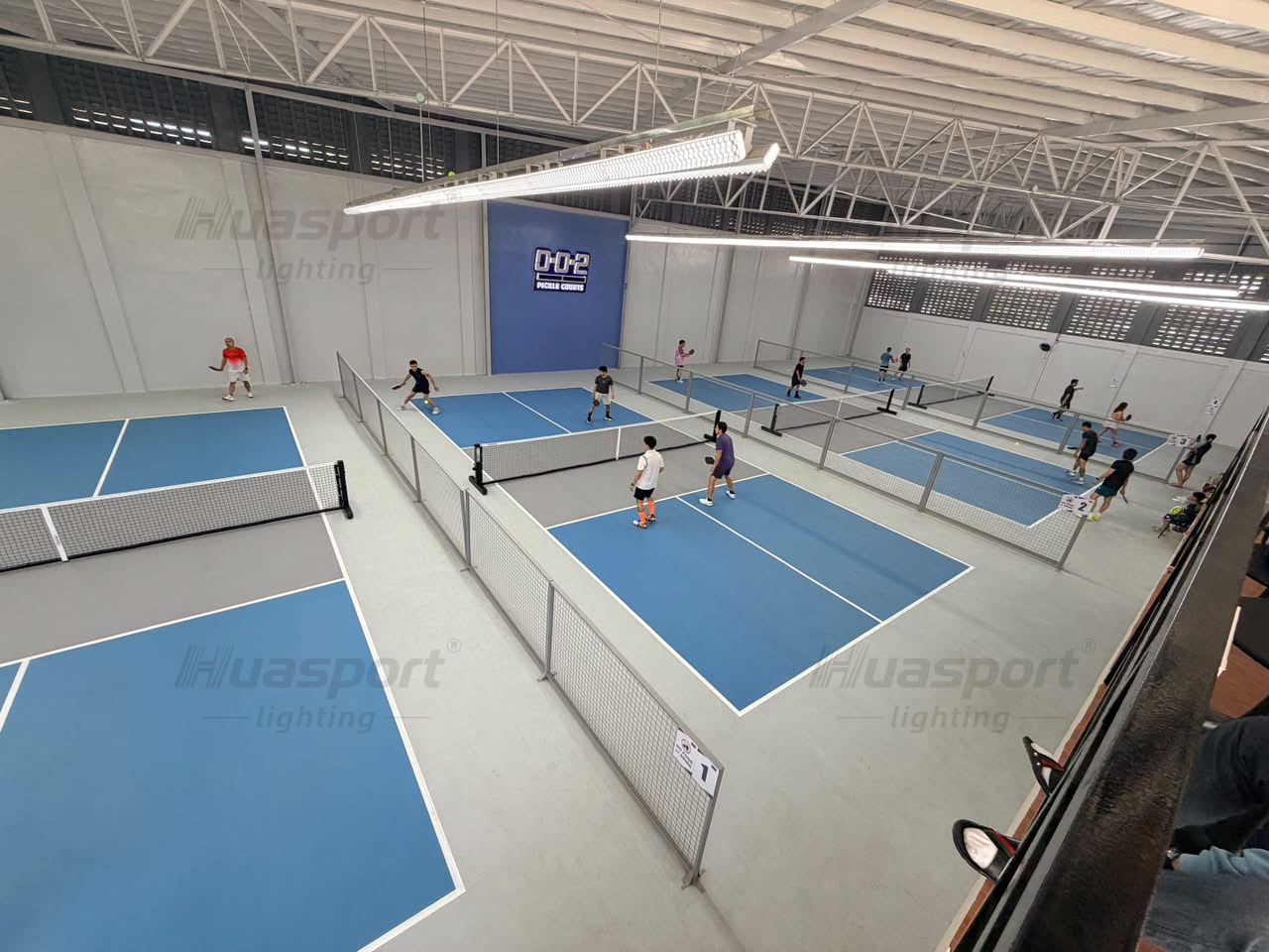 Philippines indoor pickleball court player view with long-bar lighting rows for 24-fixture layout planning