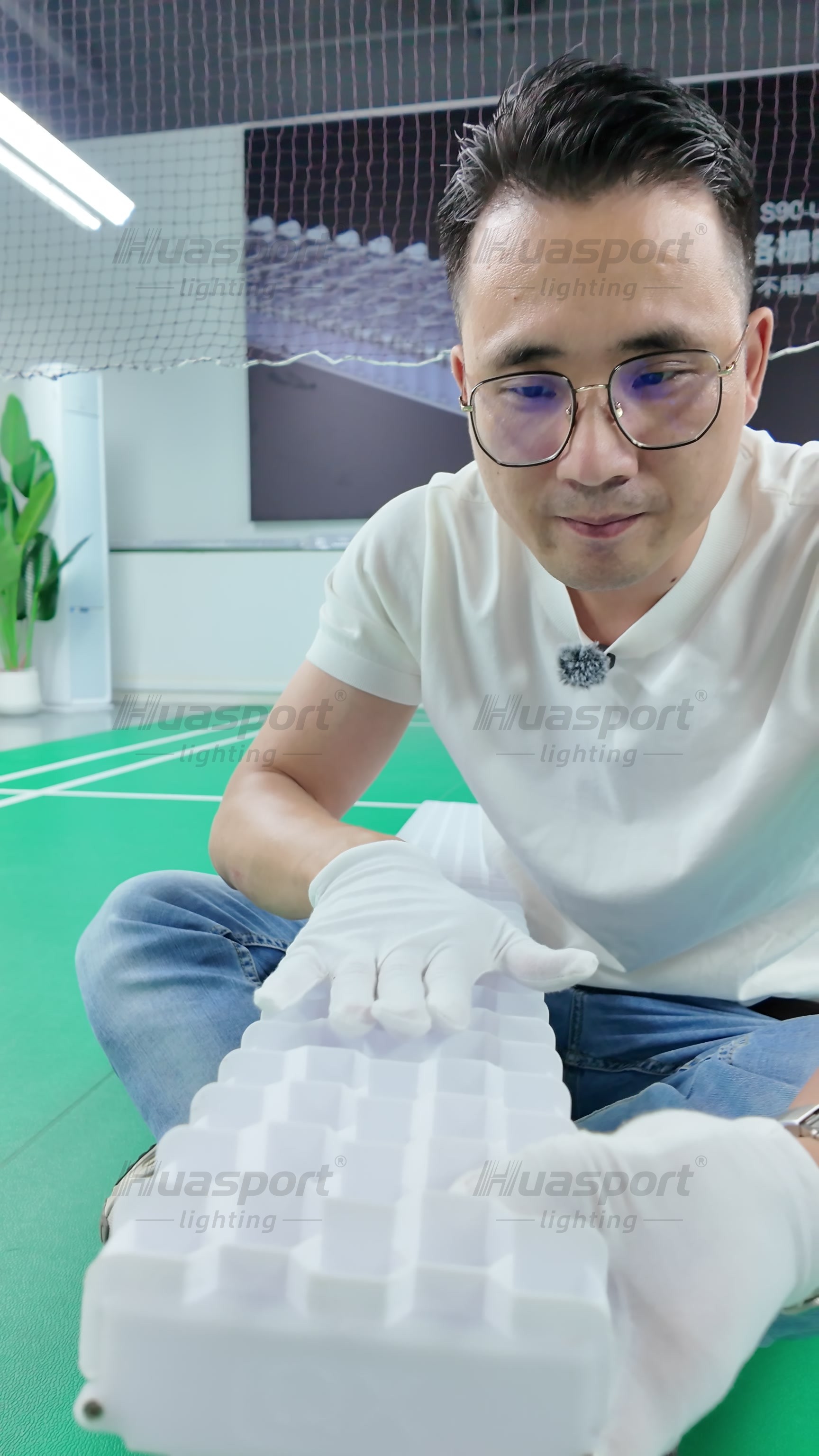 S90 product-side video frame showing the anti-glare fixture body and player-side viewing angle.