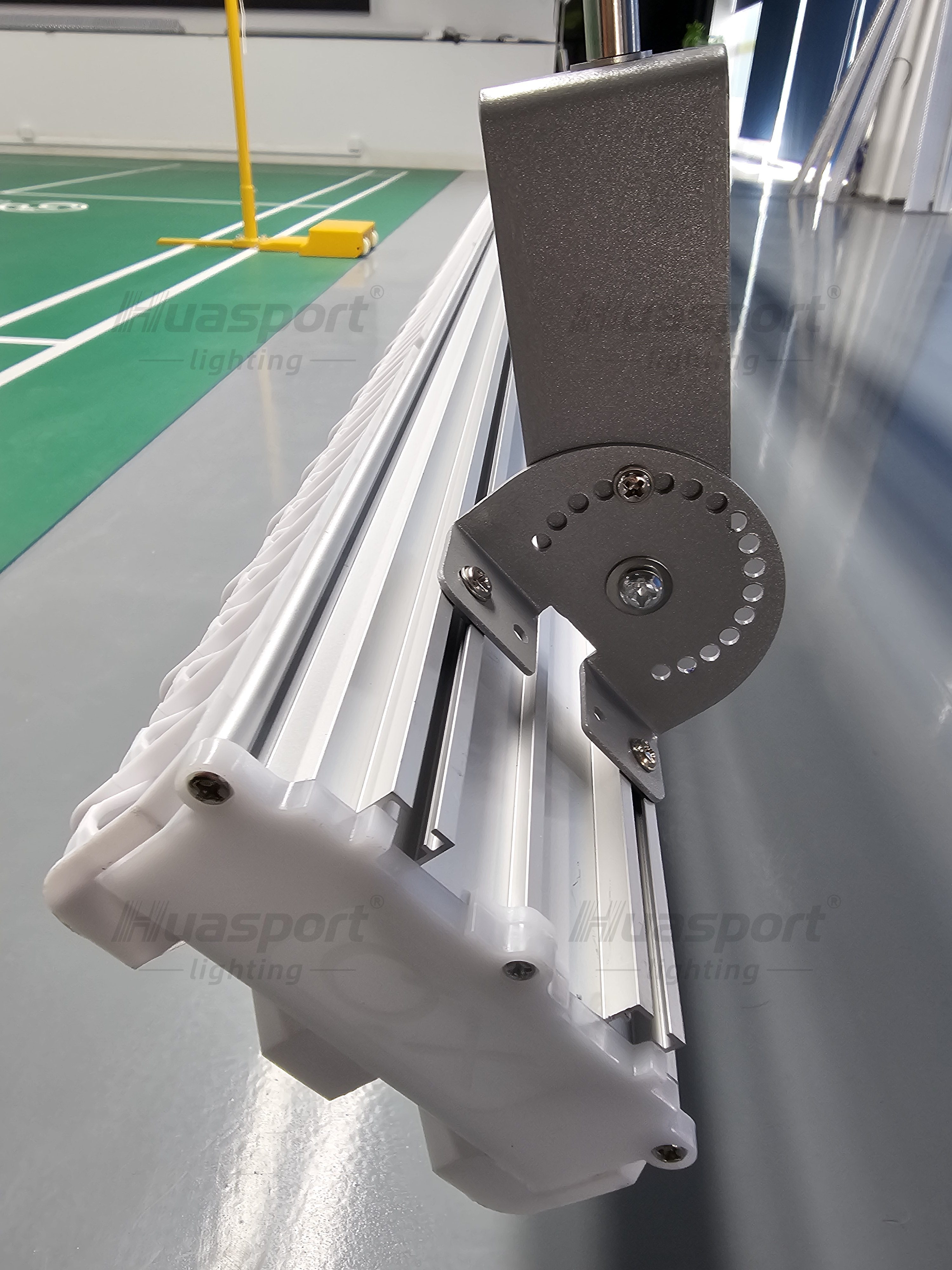 Huasport adjustable bracket reference for setting repeatable inward aiming on court lighting fixtures.