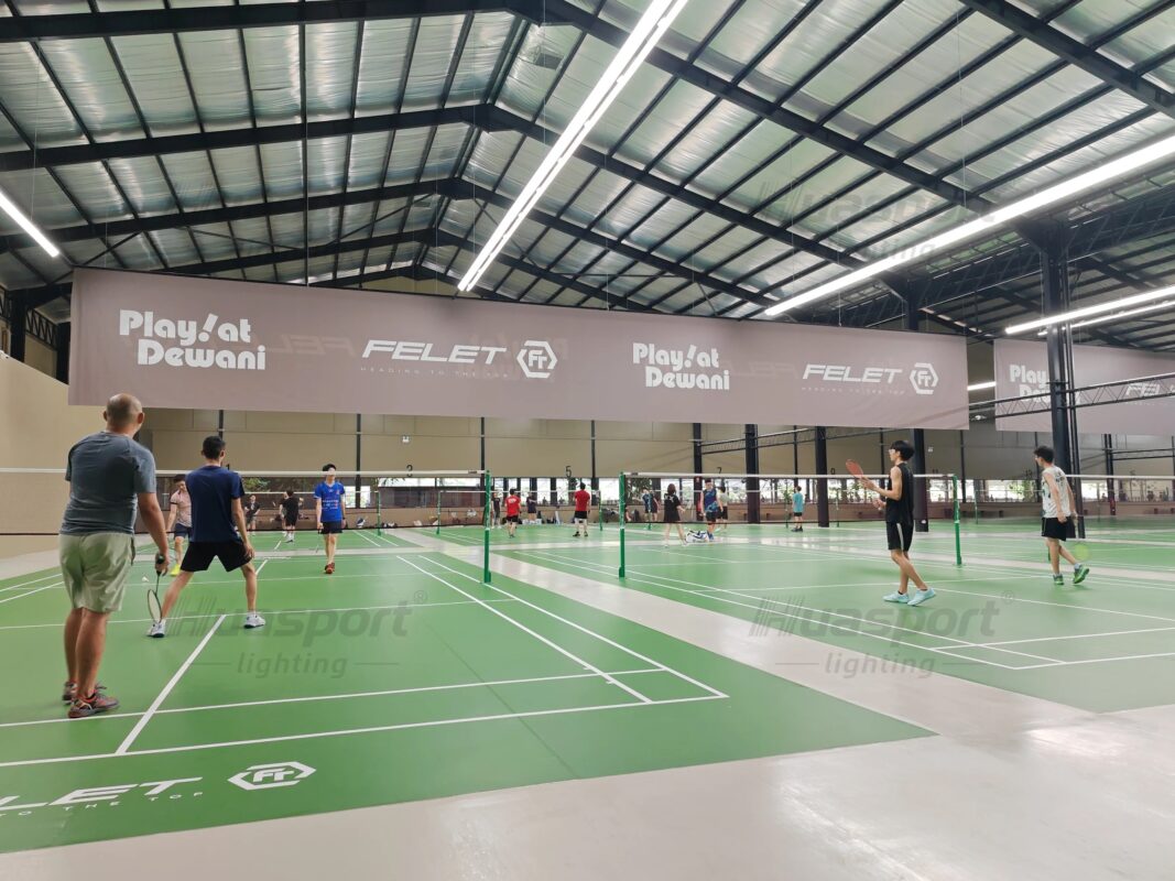 Malaysia badminton hall player-view lighting check with long-bar court lights