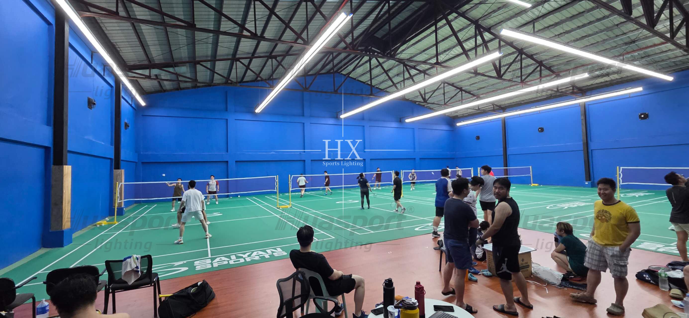 Philippines badminton training hall with Huasport anti-glare long-bar court lighting