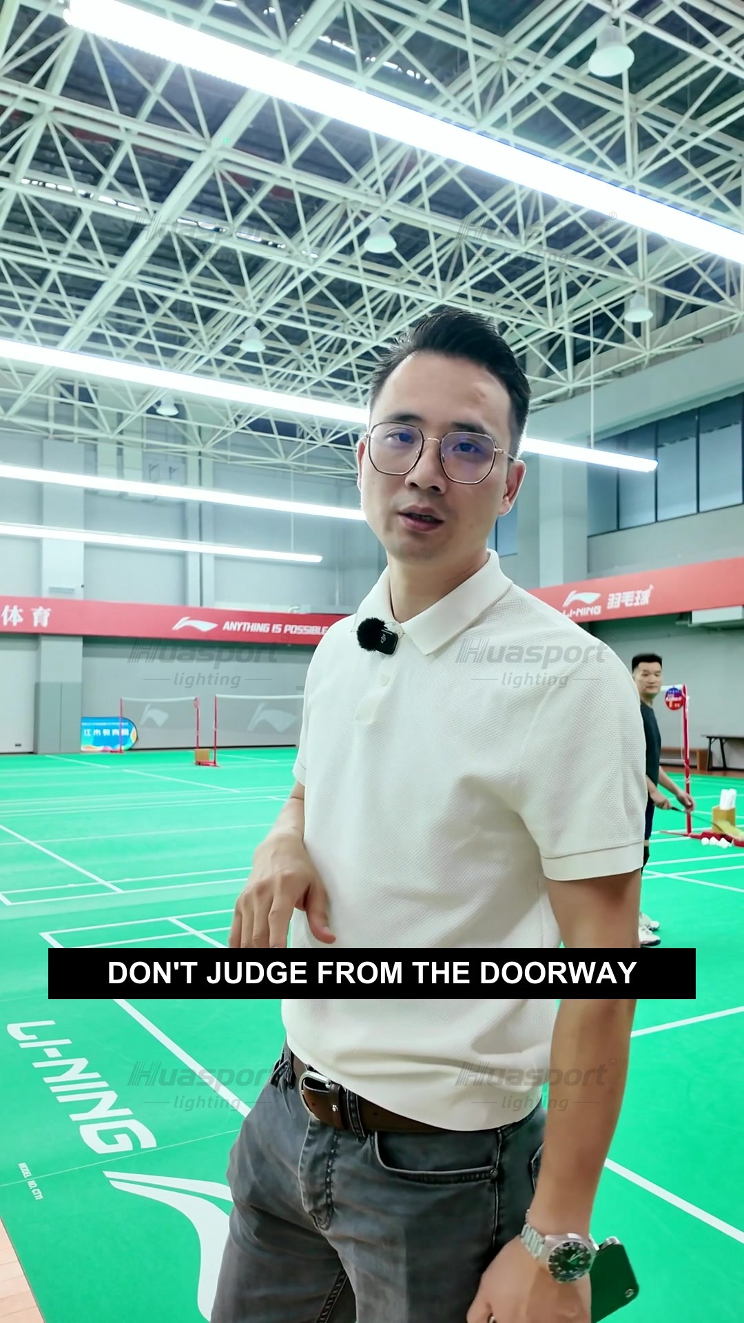 Badminton hall player-view lighting check under S90 long-bar lights instead of doorway brightness