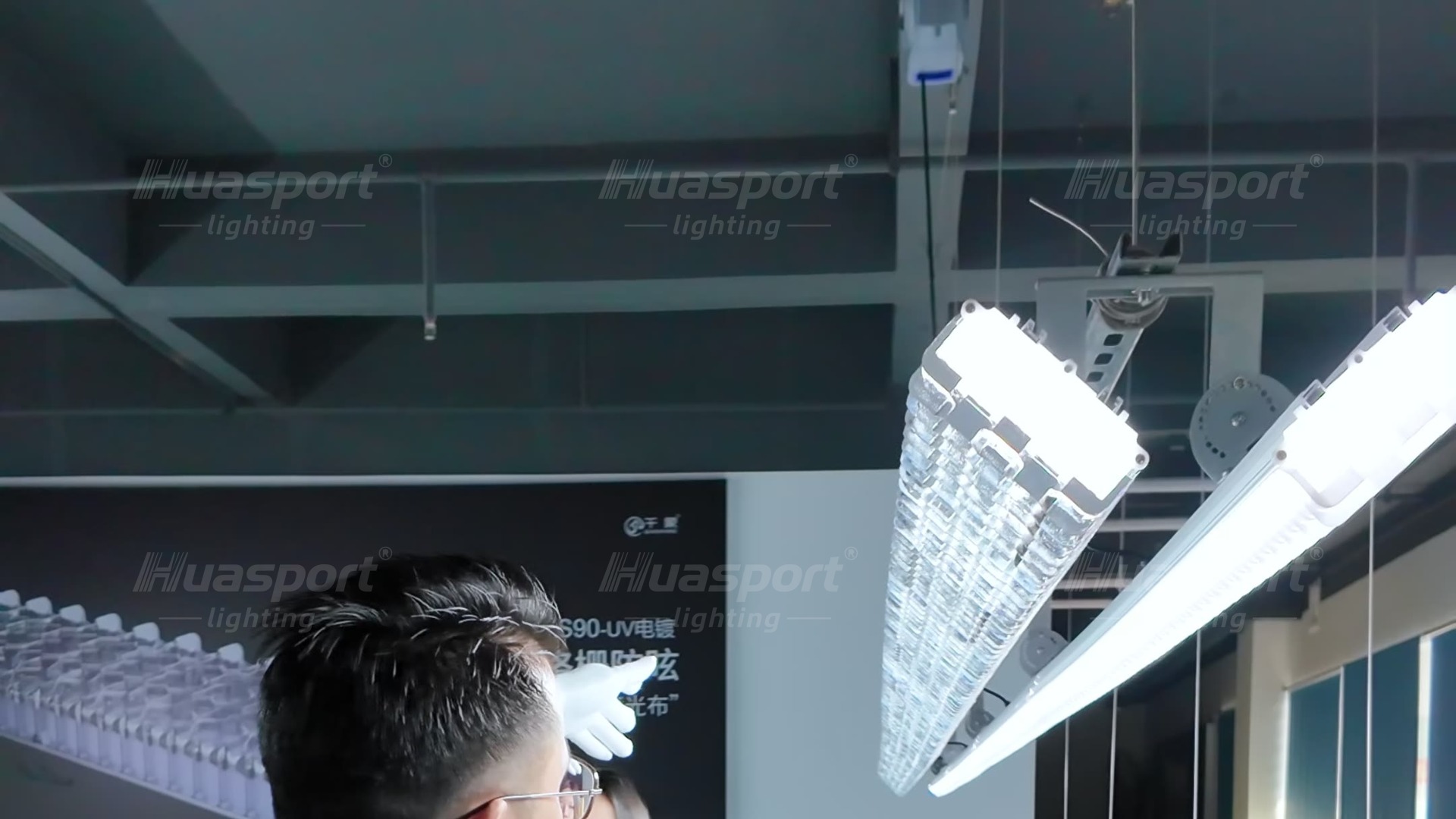 Huasport S90 plated badminton hall lighting fixture checked from player viewing angle